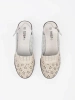 Beige perforated low heel sandals