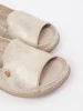 Golden sandals with leather insole