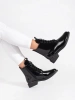 Lace-up black ankle boots made from patent faux leather