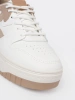 White and beige platform sneakers