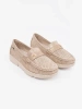 Beige perforated loafers with a gold detail