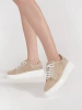 Beige leather sneakers with thick soles