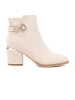 Light beige ankle boots with decorative buckle