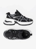 Black sneakers with breathable upper and chunky white sole