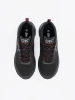 Black sports shoes with red accents