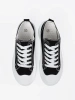 Black and white chunky sole sneakers
