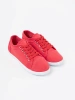 Red lace-up sneakers