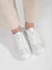 Białe sneakersy ażurowe ze skóry naturalnej
