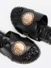 Black slides with gold embellishment