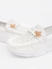 White lightweight loafers with a pin