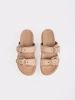 Beige flat flip-flops with buckles