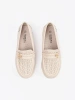 Light beige loafers with a pin