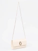 Light beige clutch with silver elements