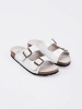 White flat sandals