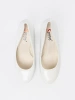 White Patent Pumps