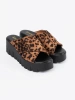 Suede women's wedge mules in leopard print