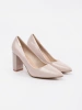 Beige patent block heel pumps
