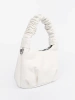 Small white handbag with a ruched handle