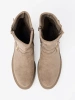 Beige suede ankle boots with decorative buckles