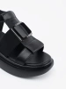 Elegant black leather platform sandals