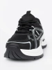 Black sneakers with breathable upper and chunky white sole