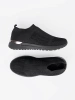 Black slip-on sports shoes with mesh upper