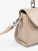 Beige small shoulder bag with a handle