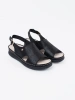 Black flat buckle sandals