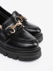 Classic black loafers with metal buckle