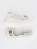 White flat sandals with embellishment