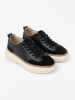 Black Leather Sneakers on Beige Platform by Sergio Leone