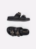 Black flat flip-flops with buckles