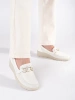 White wedge loafers with decorative chain