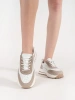 White-beige leather perforated sneakers on thick soles