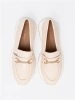 Light beige moccasins with decorative gold element