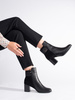Chic Black Heeled Boots with Decorative Strap