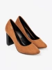 Light brown pumps on a black column heel