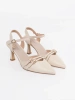 Light beige slingback pumps
