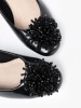 Patent Leather Pumps with Striking Embellishment