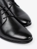 Elegant men's half-shoes in classic black and gloss