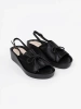 Black wedge sandals with leather insole