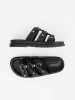 Women's black slides decorated with three straps