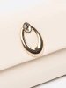 Light beige clutch with silver elements
