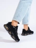 Women's sporty shoes on a rubber platform