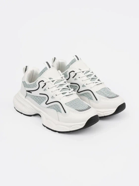 Biało zielone sneakersy z ozdobnymi wstawkami