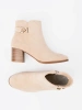 Elegant light beige ankle boots
