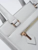 Gray boxy handbag with decorative zipper