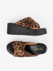 Suede women's wedge mules in leopard print