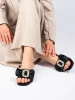 Black slip-on sandals with a bow