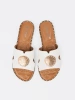 White slides with gold embellishment